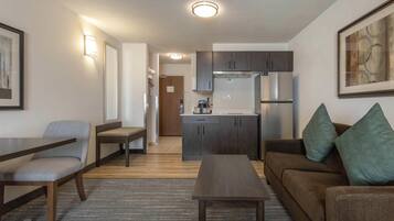 Suite, 1 King Bed, Non Smoking, Kitchenette (Dining Table;with Sofabed) | Desk, laptop workspace, blackout drapes, iron/ironing board