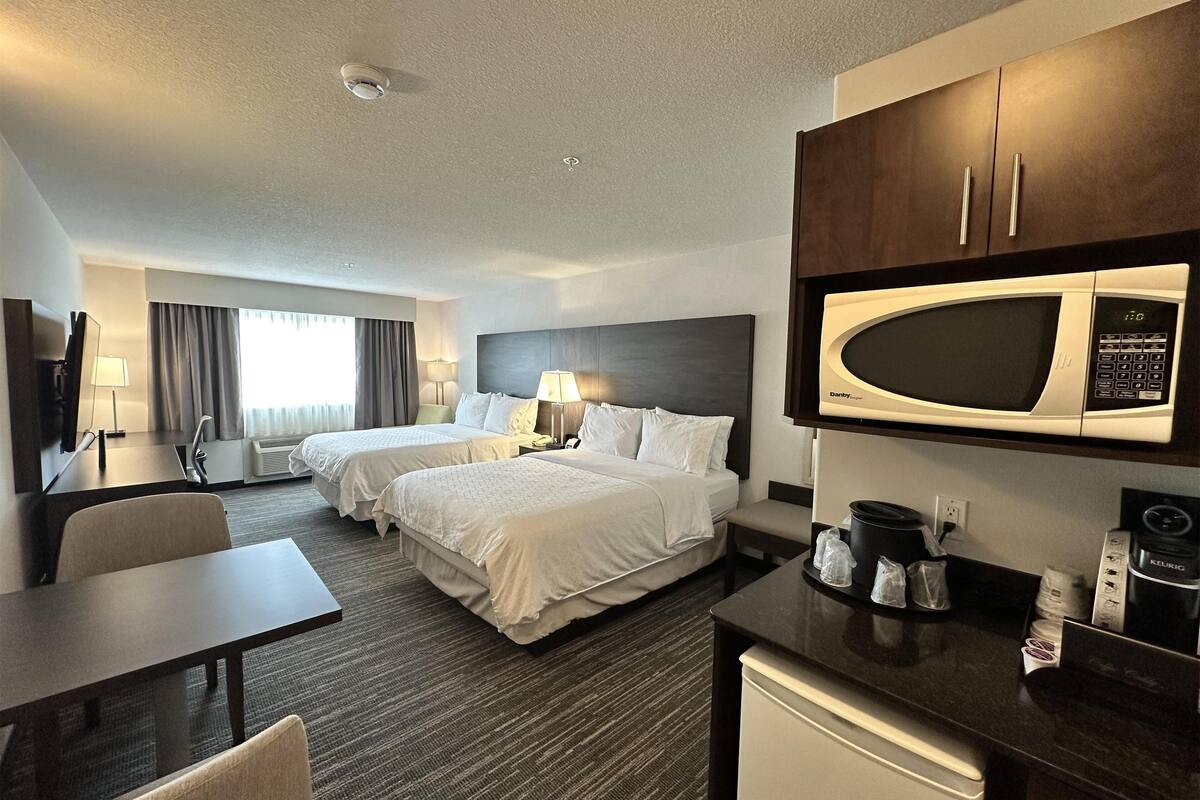 desk, laptop workspace, blackout curtains, iron/ironing board