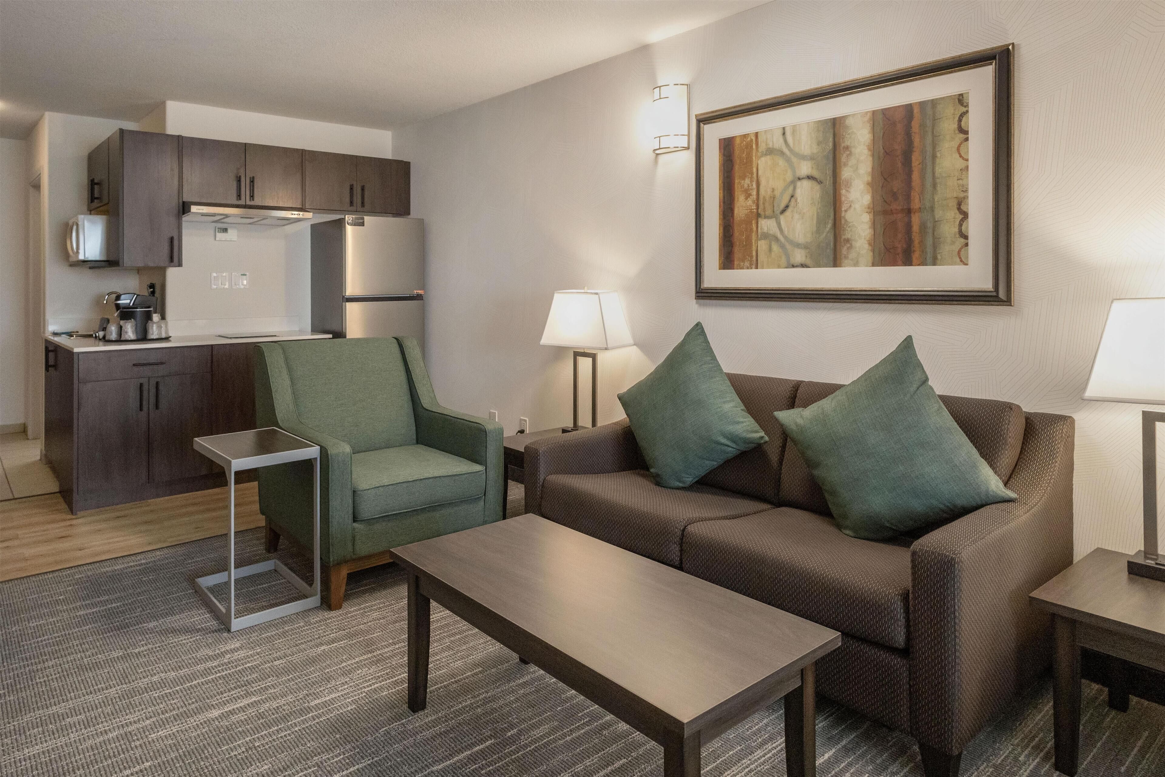 Desk, laptop workspace, blackout drapes, iron/ironing board