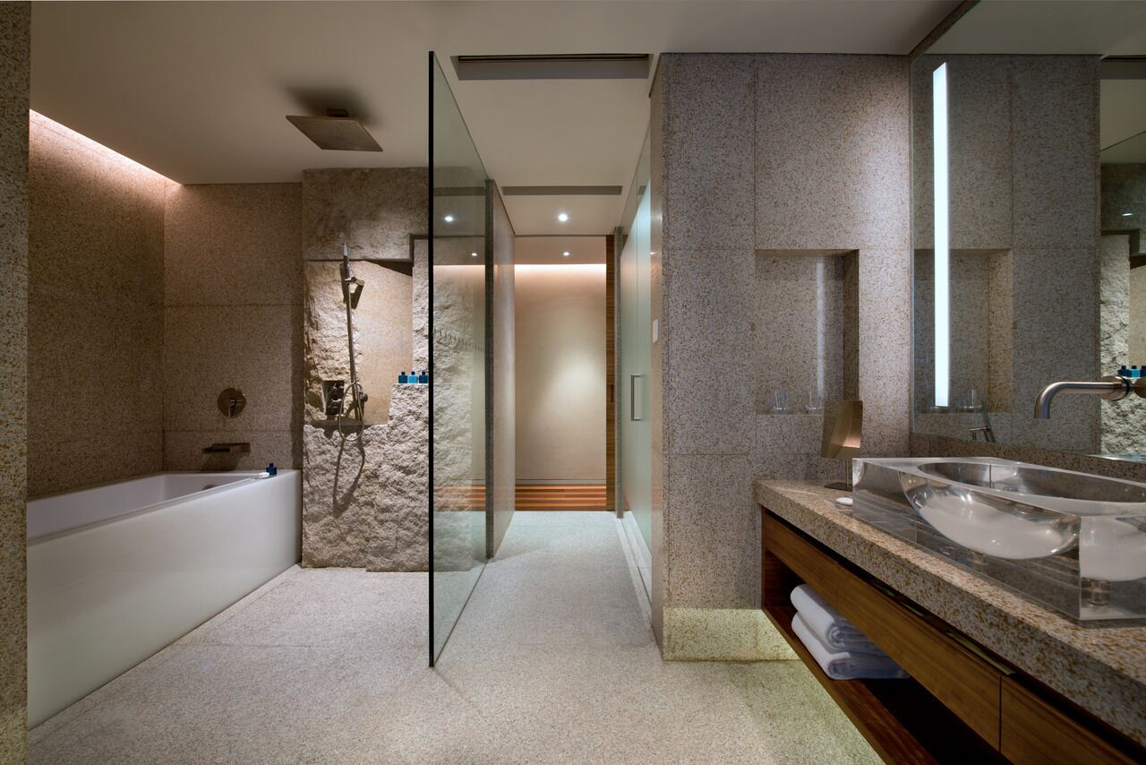 designer toiletries, hair dryer, bathrobes, slippers