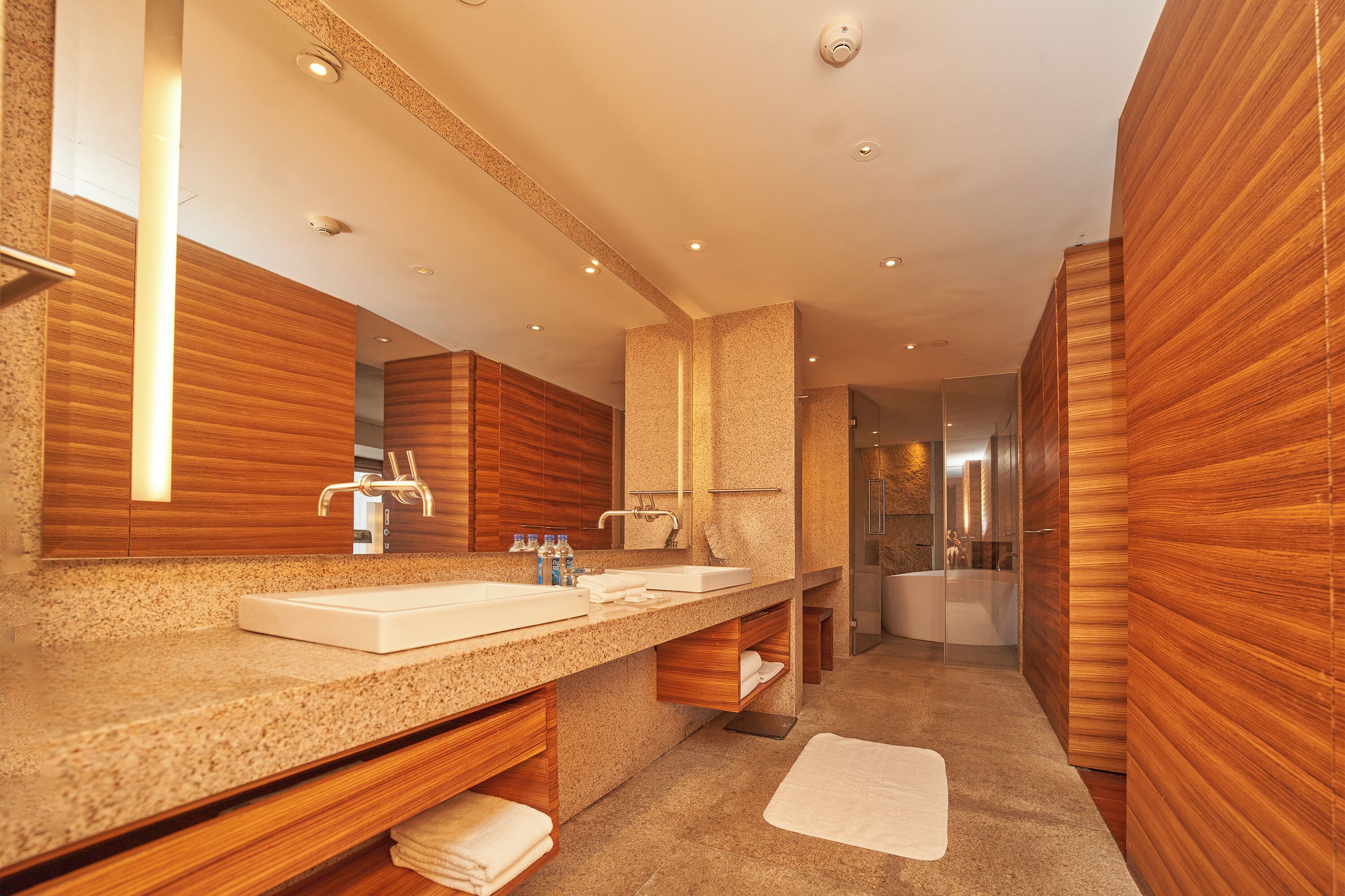 andaz loft suite | bathroom | designer toiletries, hair dryer, bathrobes, slippers
