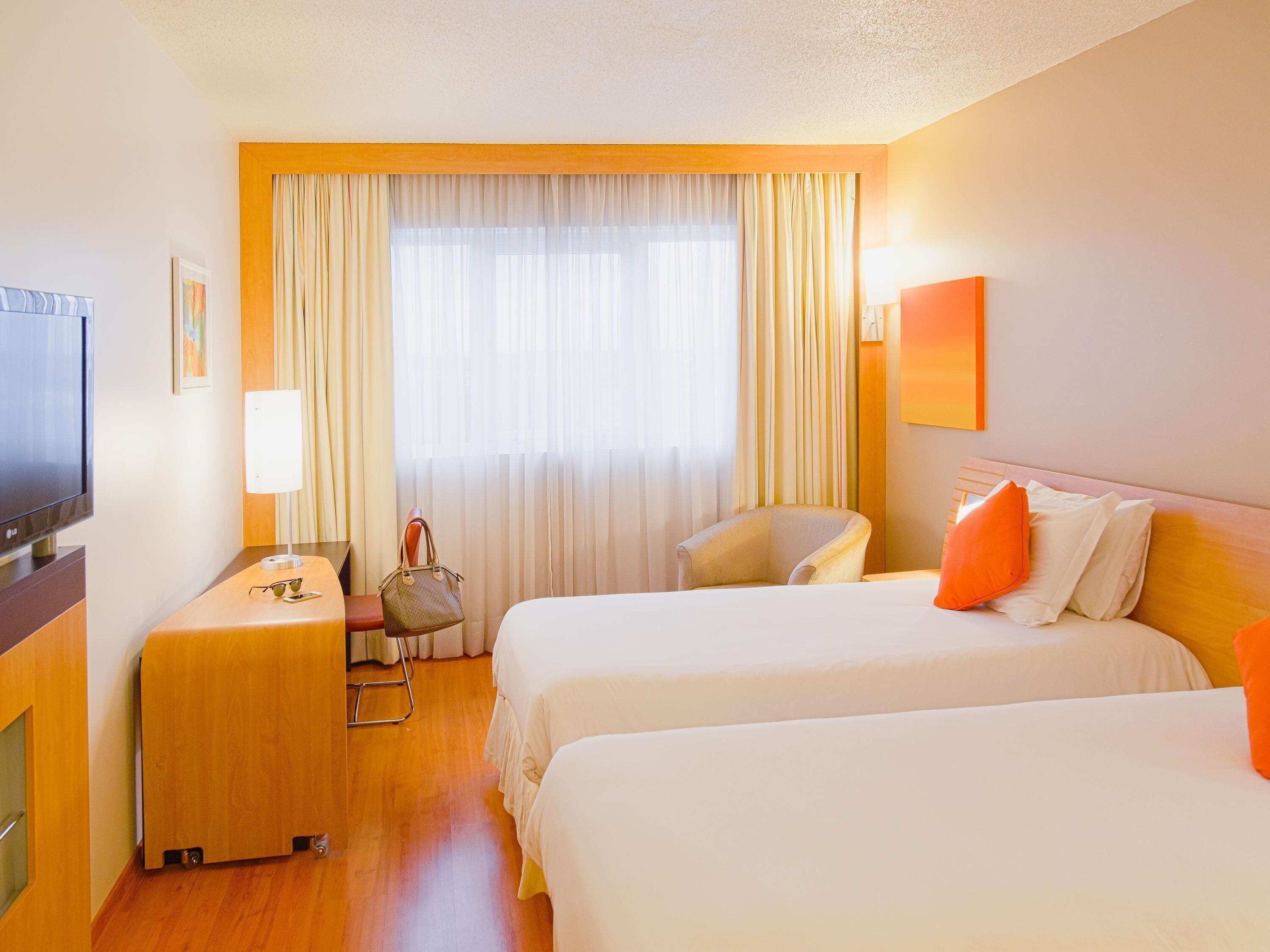 Literie hypoallergénique, minibar, coffres-forts dans les chambres