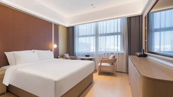 Cubrecamas, colchones con pillow-top y minibar