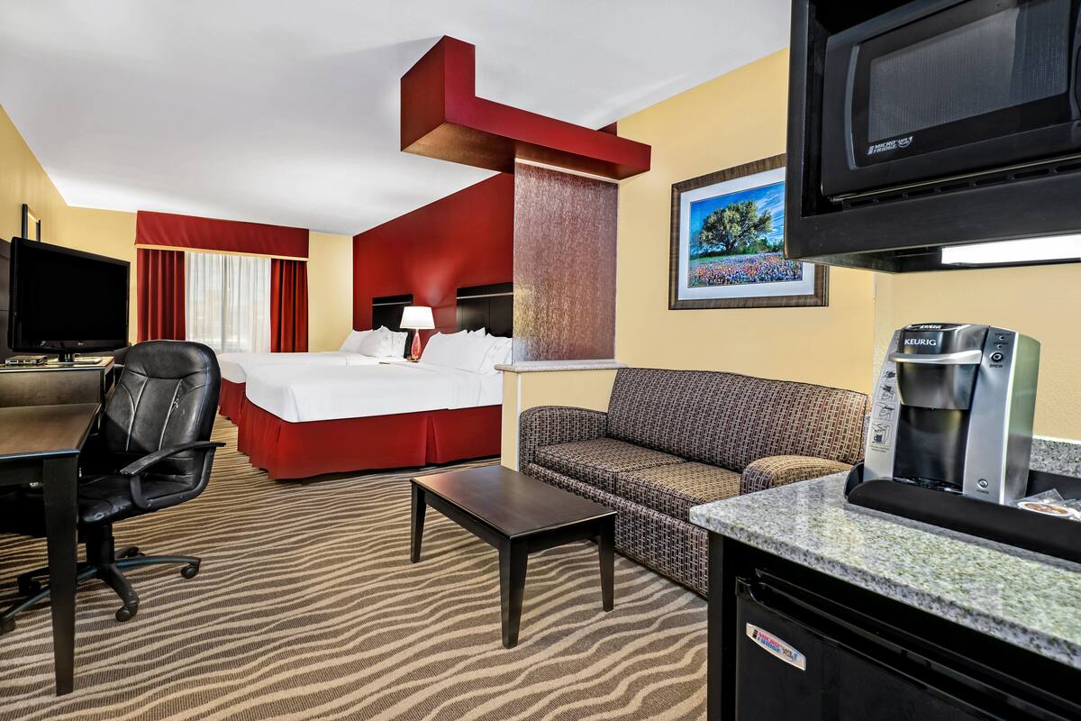 suite, 2 queen beds (living area) | in-room safe, desk, iron/ironing board, free cots/infant beds