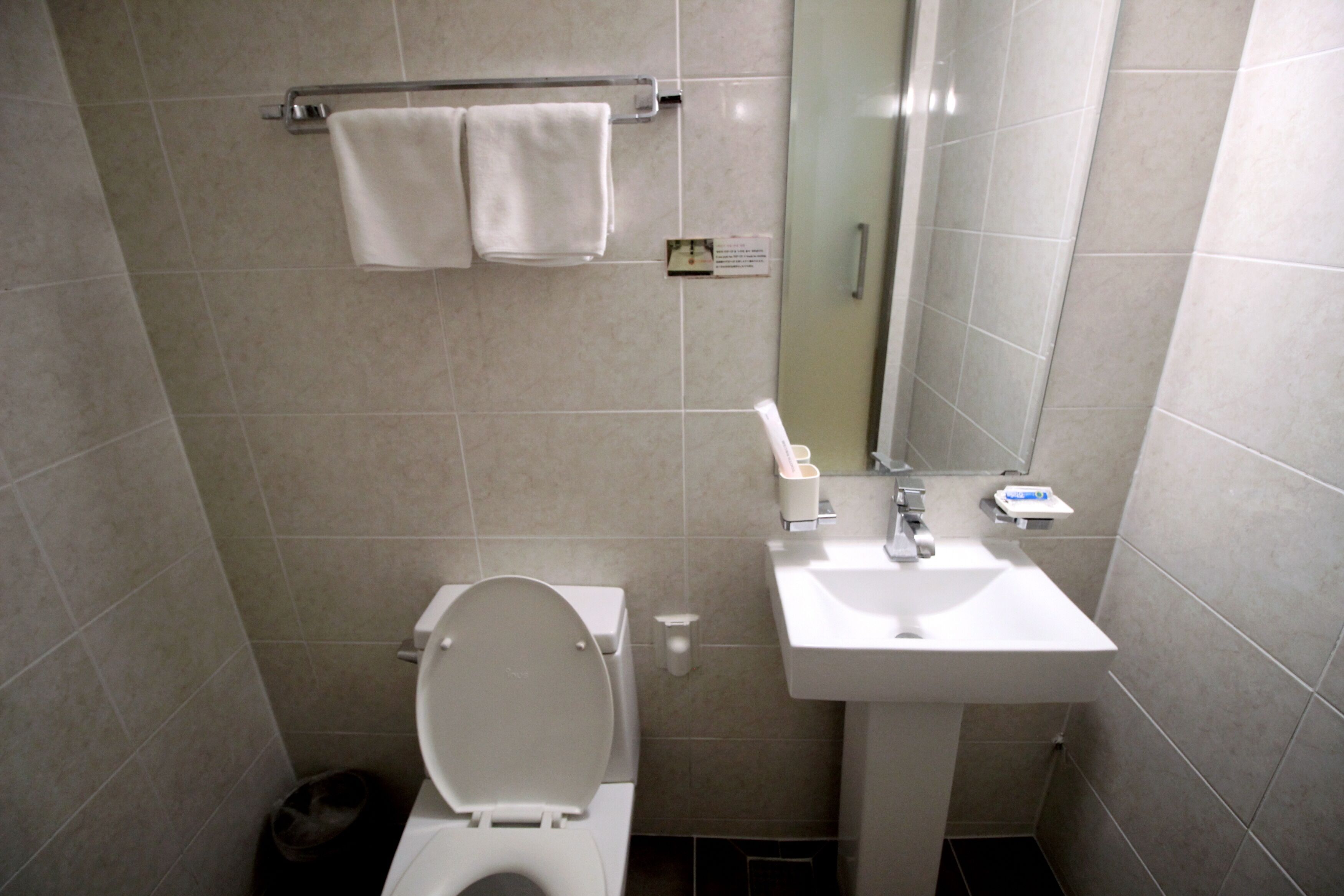standard single room, no windows | bathroom | free toiletries, hair dryer, slippers, towels