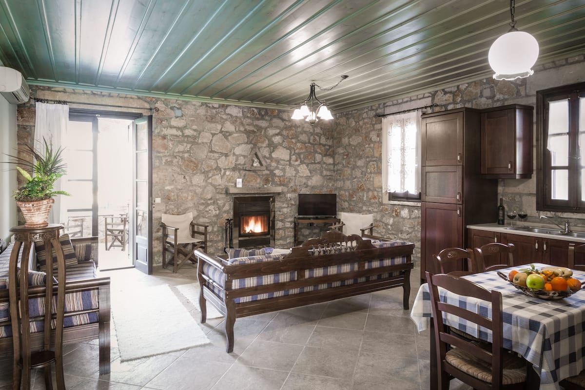 Traditional Apartment, 1 Bedroom | Living area | LED TV, fireplace