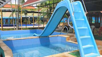 Outdoor pool, pool umbrellas, sun loungers