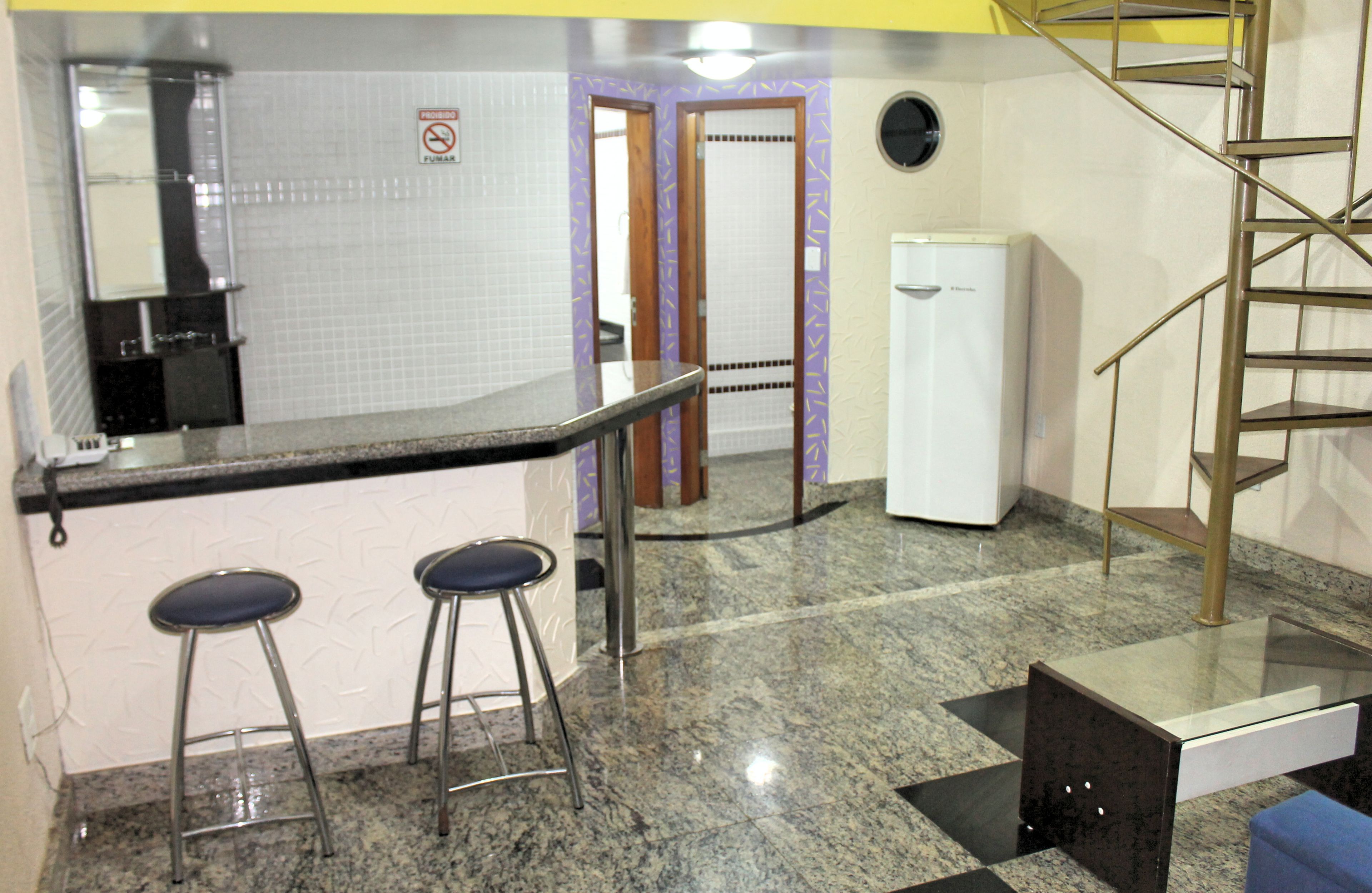 deluxe suite | living area | 32-inch flat-screen tv with digital channels