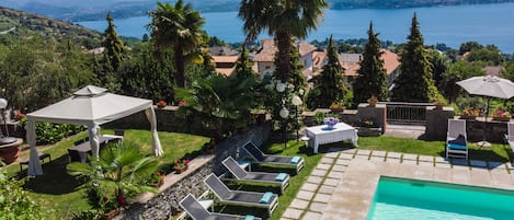 Outdoor pool, open 9:00 AM to 8:00 PM, pool umbrellas, sun loungers