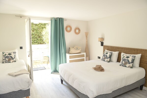 Chambre Triple Terrasse et Jardin | Vue de la chambre