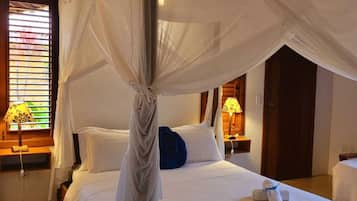 Signature Triple Room (Oxala) | In-room safe, individually decorated, laptop workspace