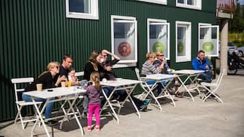 Enjoy a meal with family and friends in our outdoor seating area.