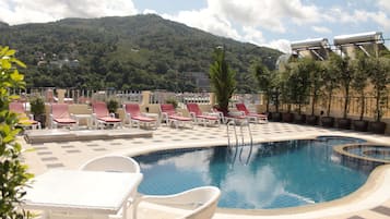 Outdoor pool, open 11:00 AM to 8:00 PM, sun loungers