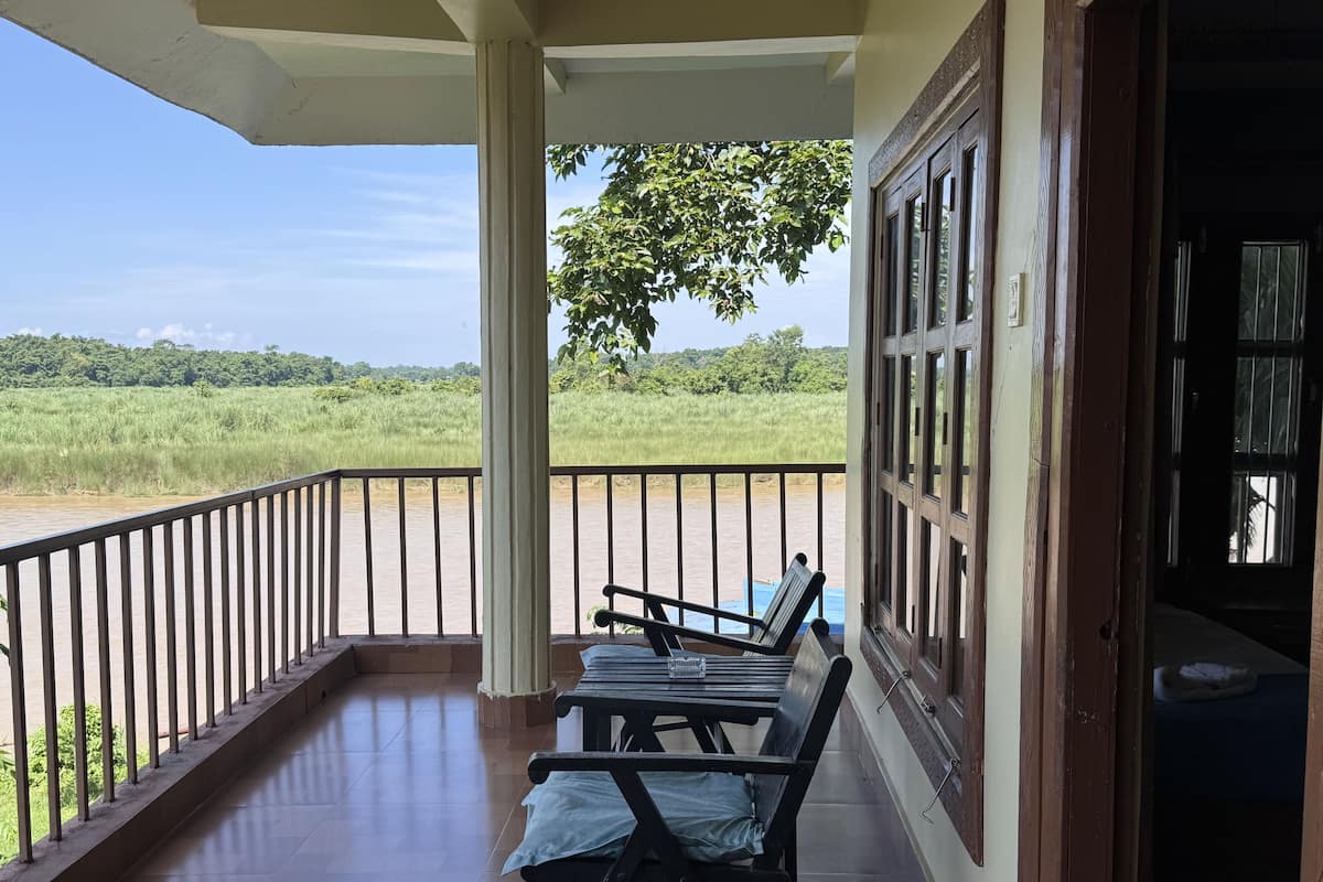 Deluxe Room, Balcony, River View | Terrace/patio