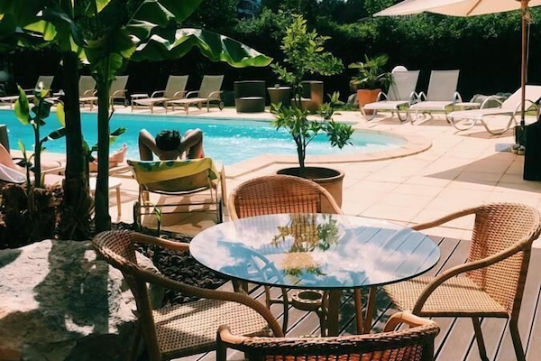 Seasonal outdoor pool, pool umbrellas, sun loungers