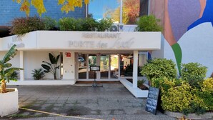 A restaurant named "RESTAURANT PORTE des JUDS" with a signboard listing amenities like coworking spaces, buffet, and bar. - La Chaumette Porte des Suds (Privas)