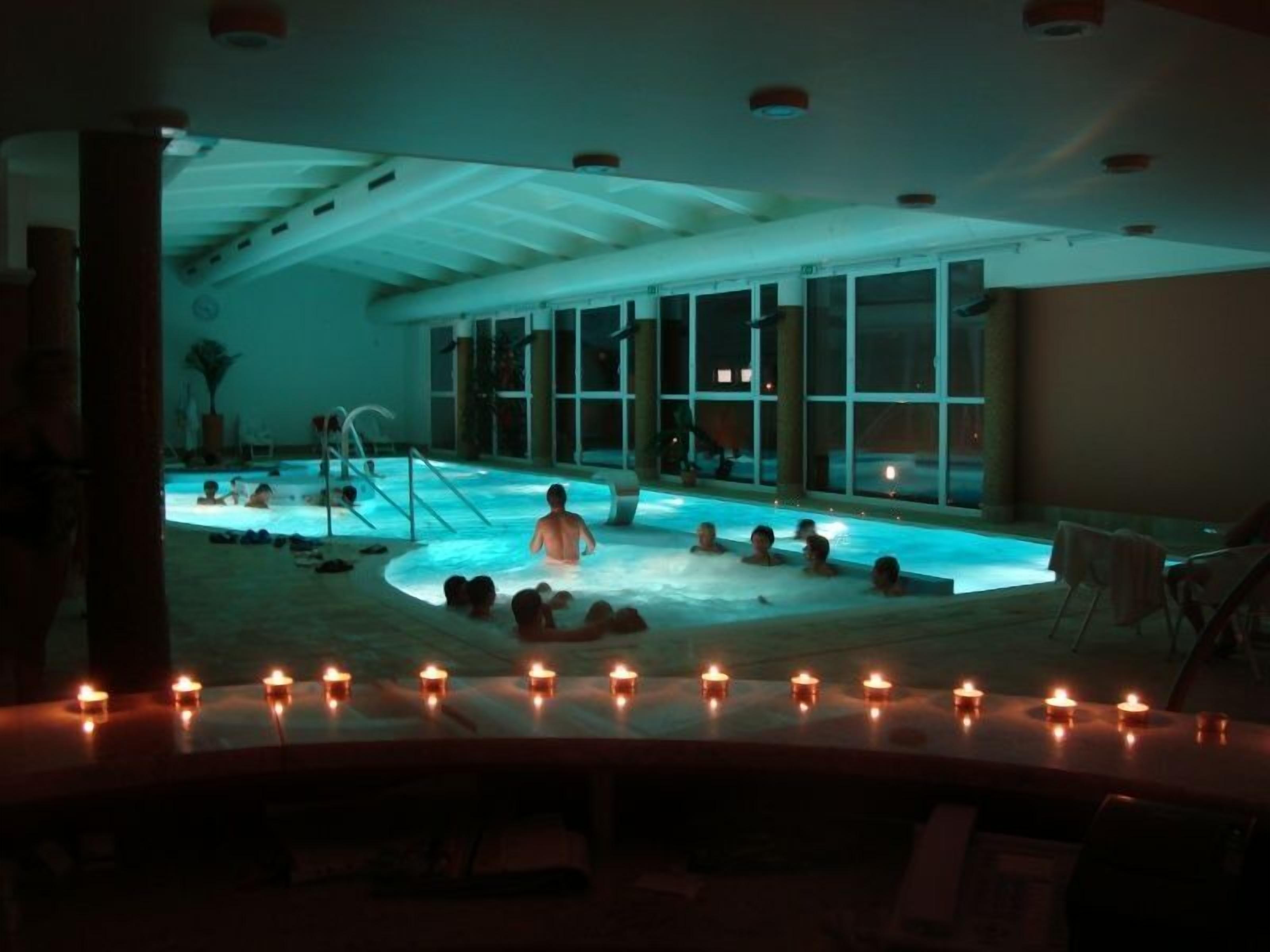 Indoor pool, pool loungers, lifeguards on site