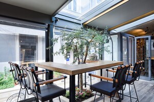 Lunch, dinner served; local and international cuisine, garden views 