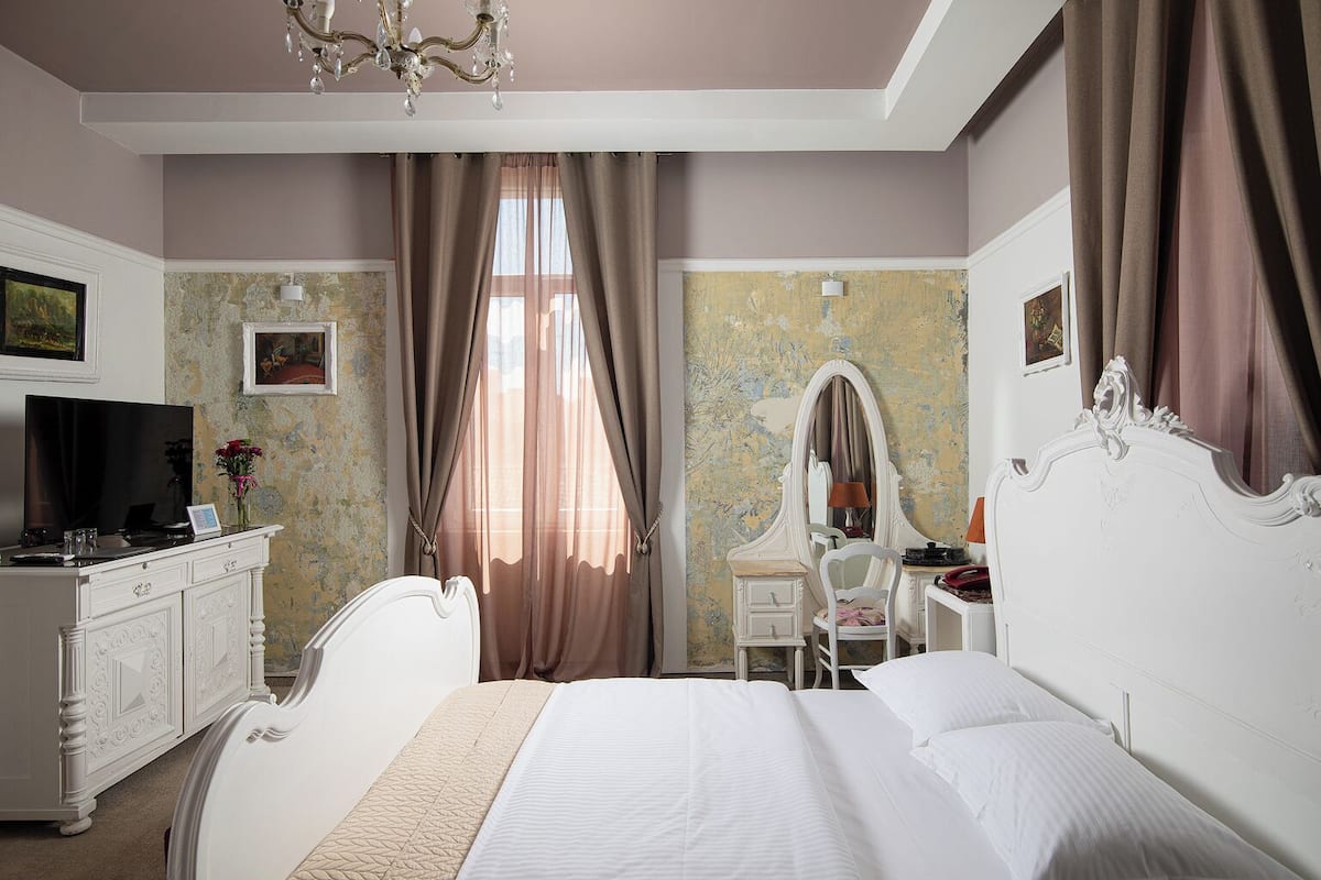 Habitación superior (Vintage) | Minibar, caja de seguridad en la habitación y decoración personalizada