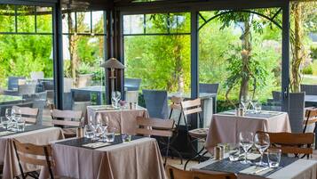 Breakfast, lunch, dinner served; garden views