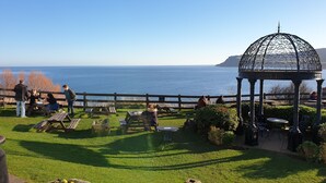 A gazebo with a metal dome and a view of the sea. - St Michael's Guest House (Scarborough)