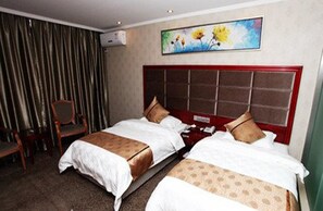 A hotel room with two beds, a large painting on the wall, and a chair. - Super 8 Hotel (Hefei)