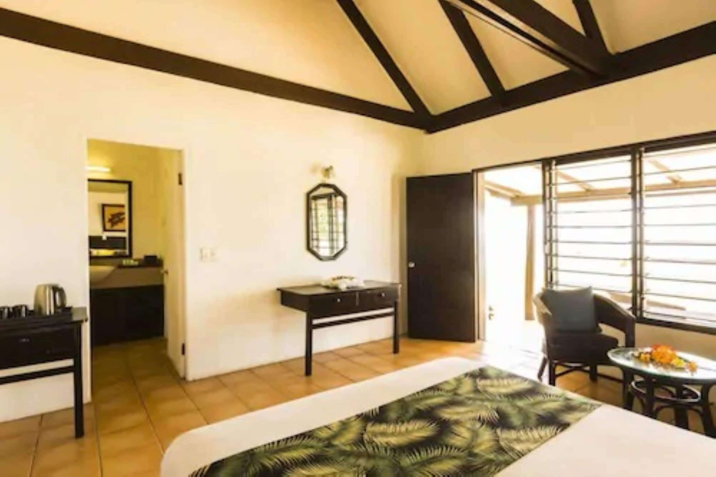 beachfront bure (1 double and 1 single bed) | 1 bedroom, in-room safe, soundproofing, iron/ironing board