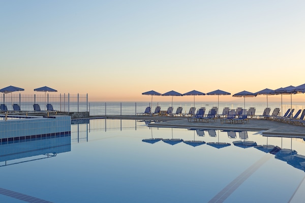 Indoor pool, seasonal outdoor pool, pool umbrellas, sun loungers