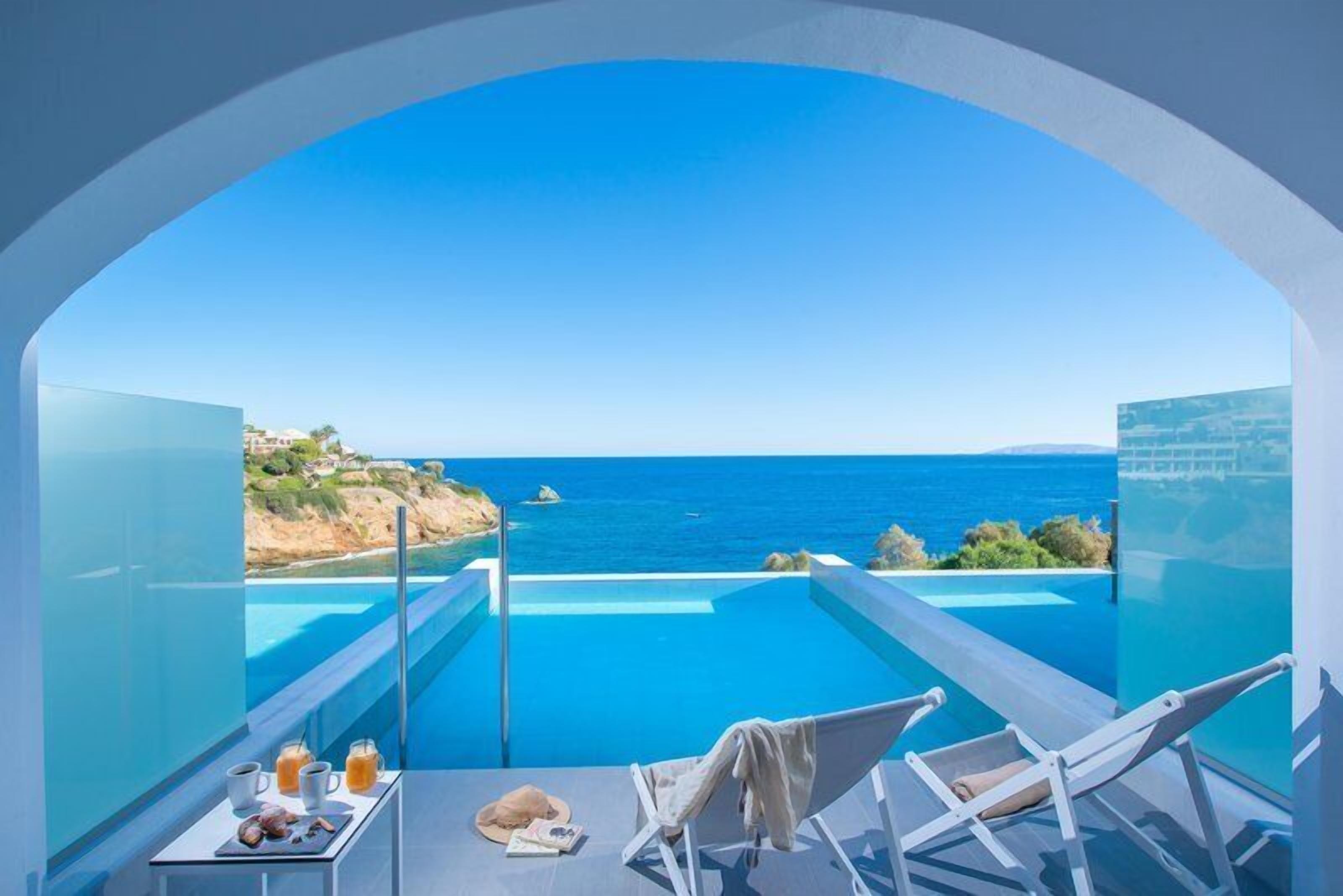 Indoor pool, seasonal outdoor pool, pool umbrellas, sun loungers