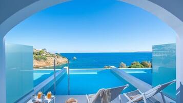 Indoor pool, seasonal outdoor pool, pool umbrellas, sun loungers