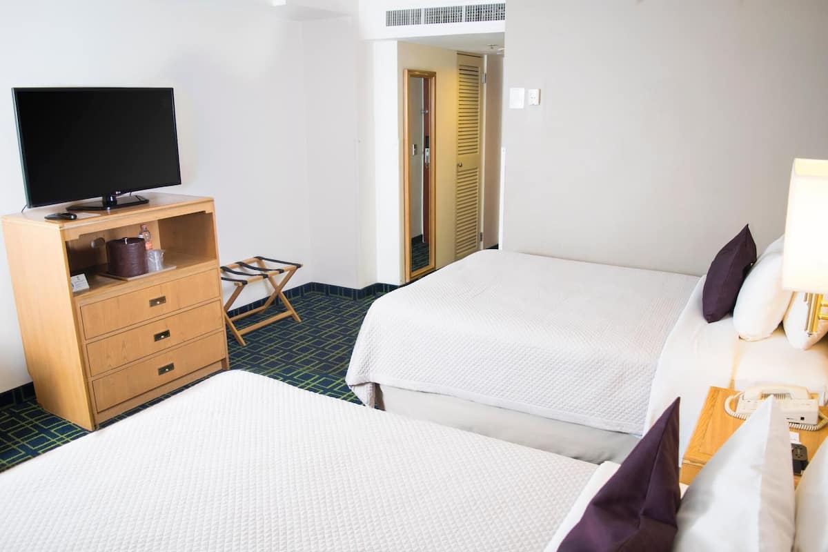 Een kluis op de kamer, gratis wifi, beddengoed, een wekker