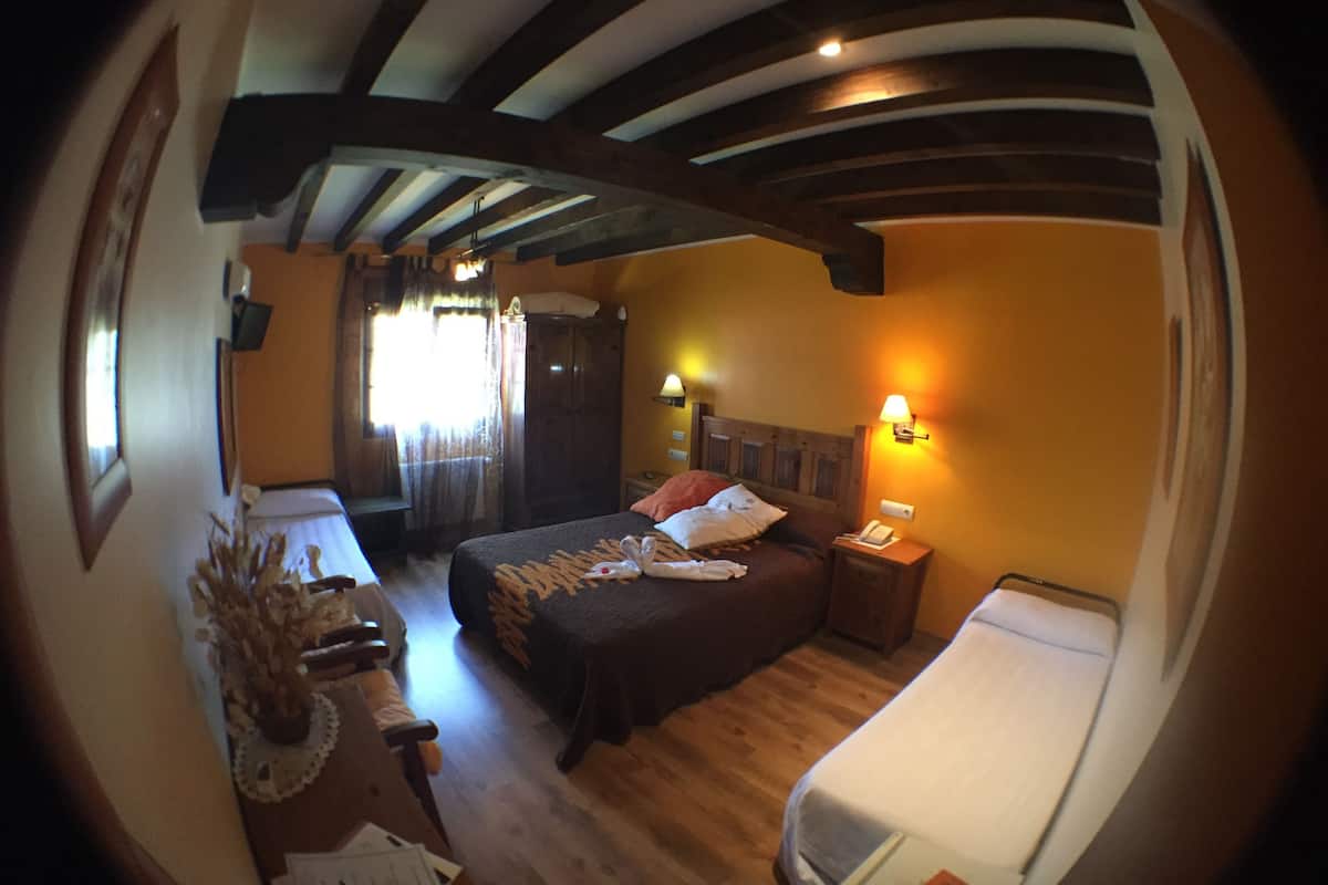 family triple room, 1 bedroom | select comfort beds, minibar, in-room safe, individually decorated