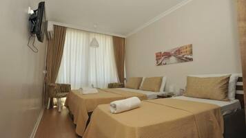 Minibar, tabla de planchar con plancha y cunas gratuitas