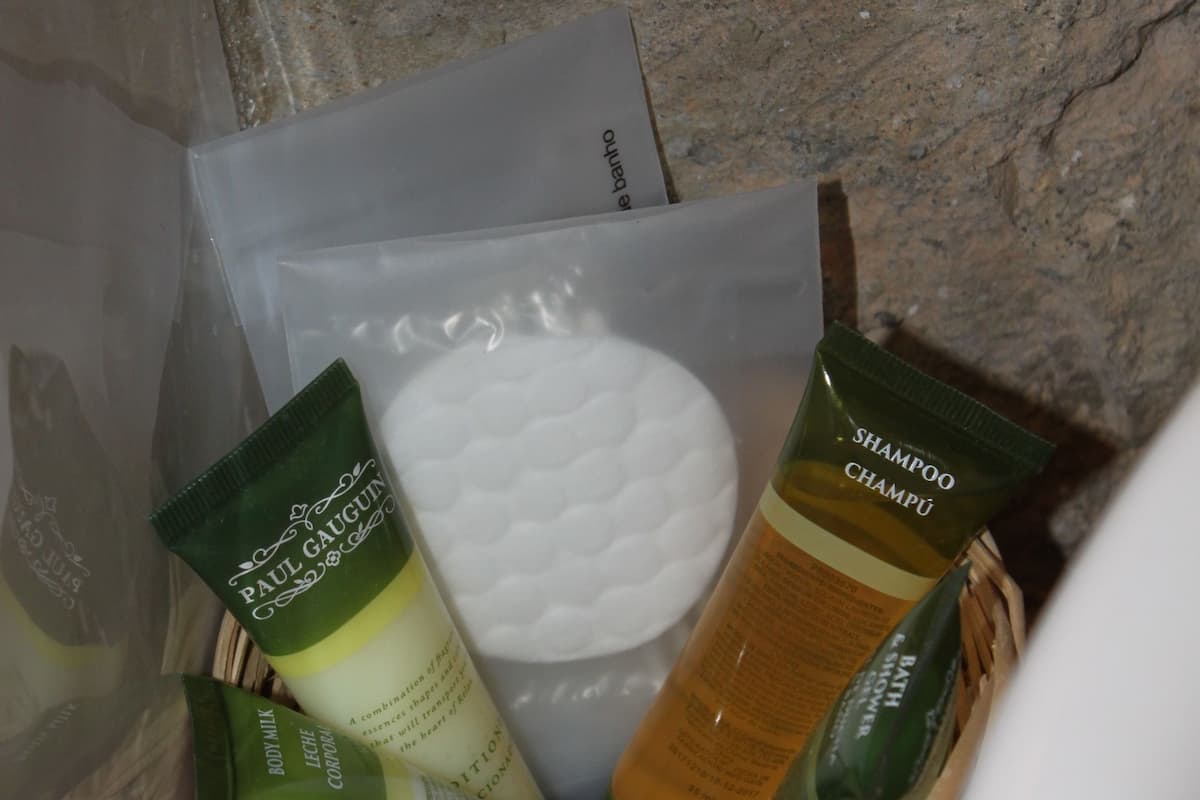 bathtub, free toiletries, hair dryer, slippers