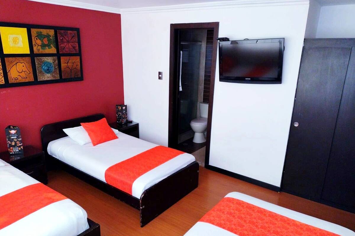 Habitación triple | Ropa de cama hipoalergénica y edredones de plumas