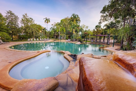 2 outdoor pools, open 6:00 AM to 9:00 PM, pool loungers. Cooinda Lodge Kakadu