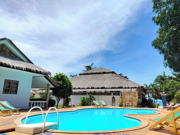 Outdoor pool, pool umbrellas, pool loungers