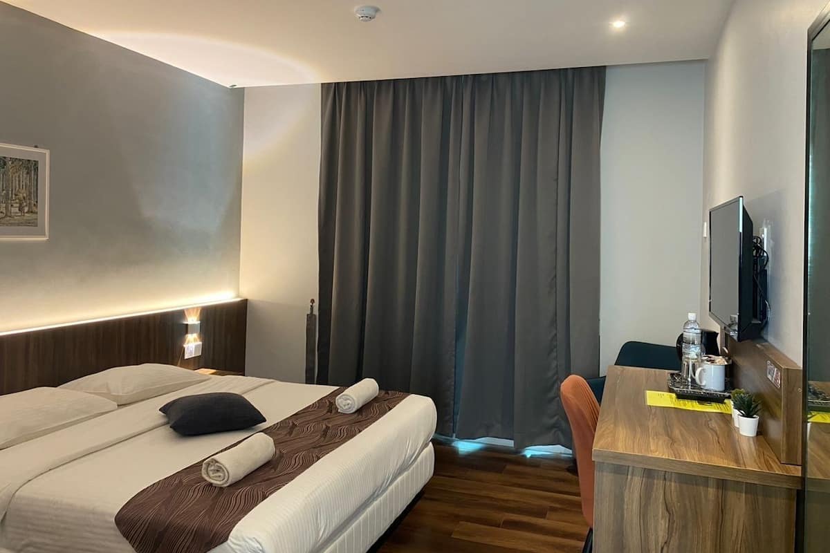 Deluxe Double Room, Pool View | Minibar, blackout drapes, soundproofing, iron/ironing board