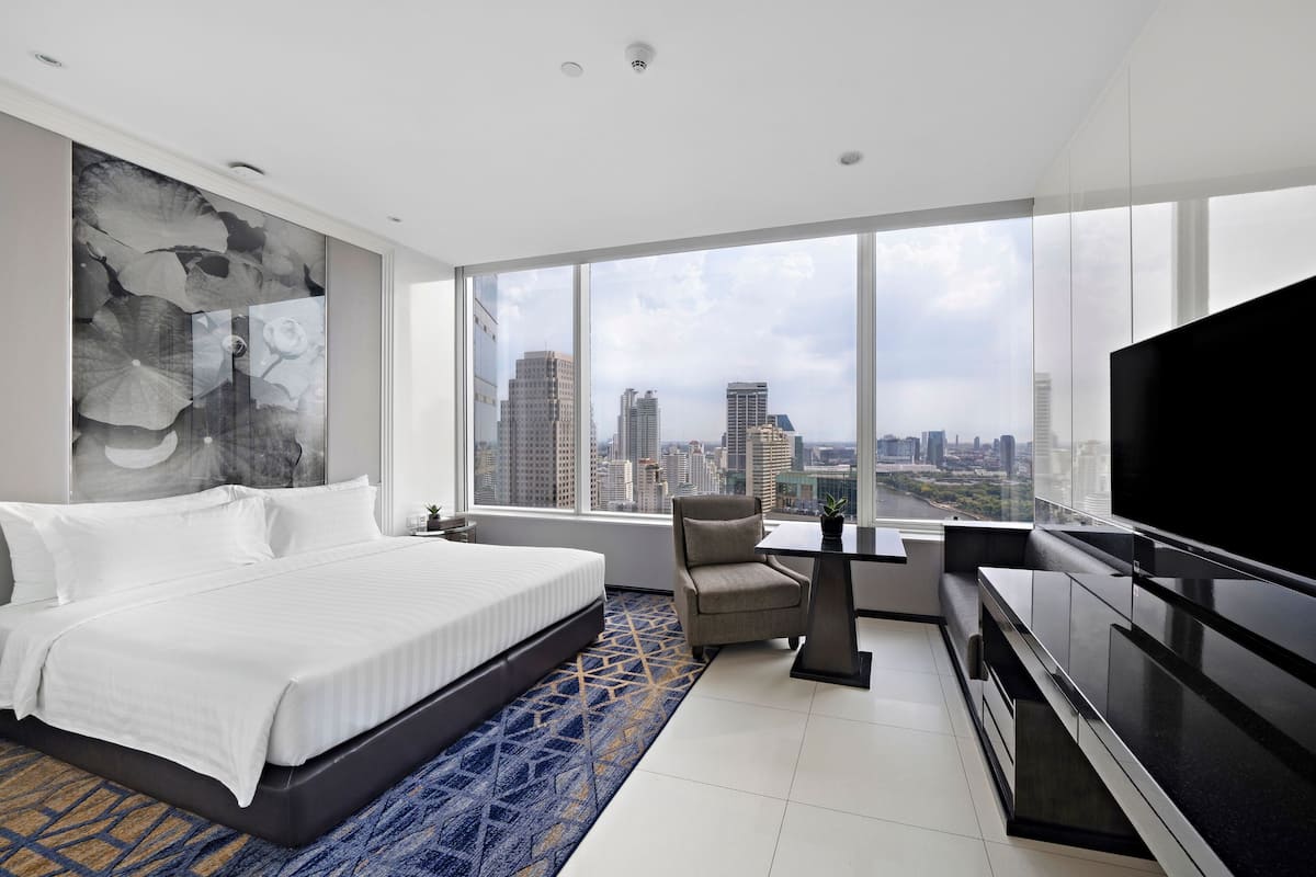 Deluxe Premium Room | 1 bedroom, premium bedding, down comforters, minibar