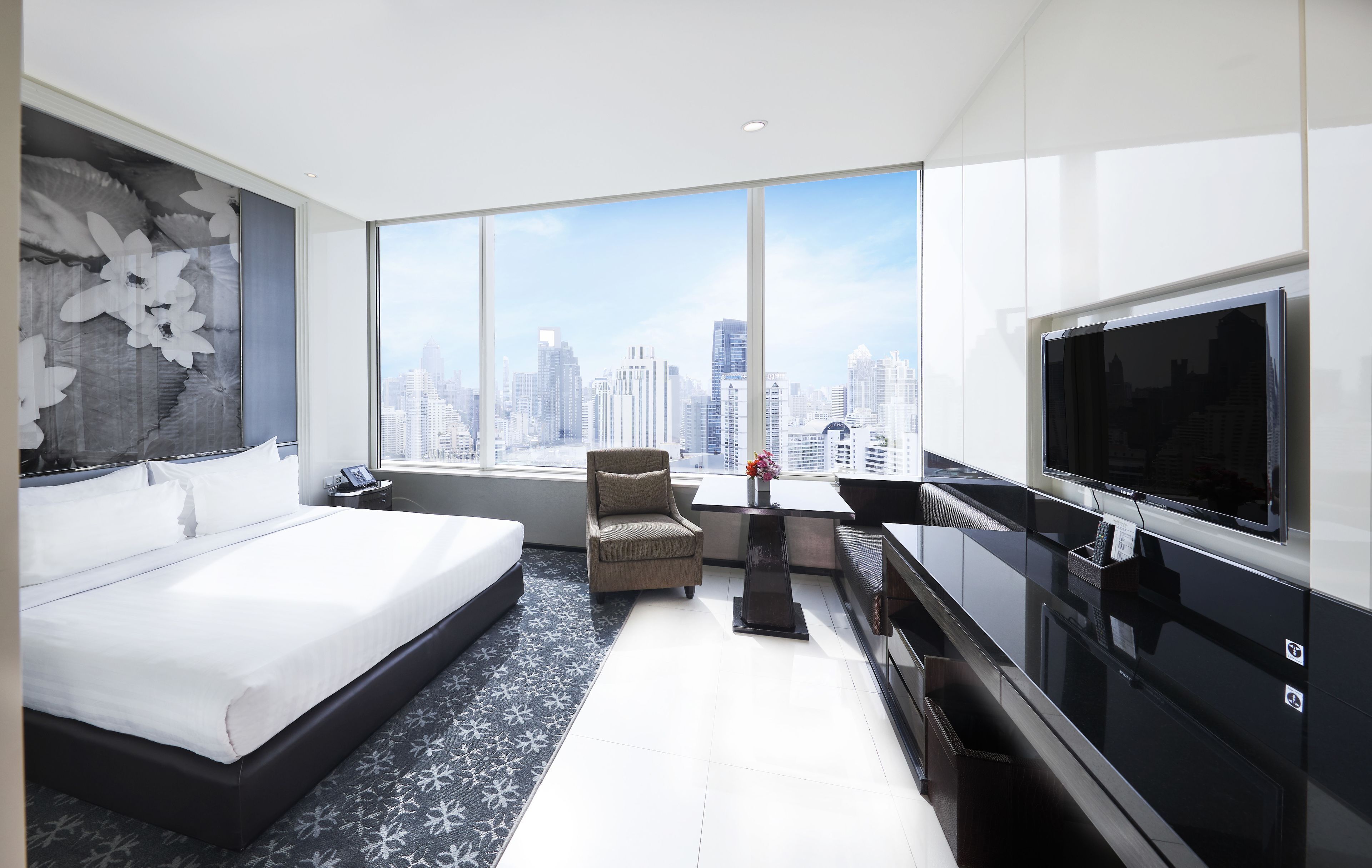 Roupas de cama premium, edredons de pluma, frigobar, cofres nos quartos