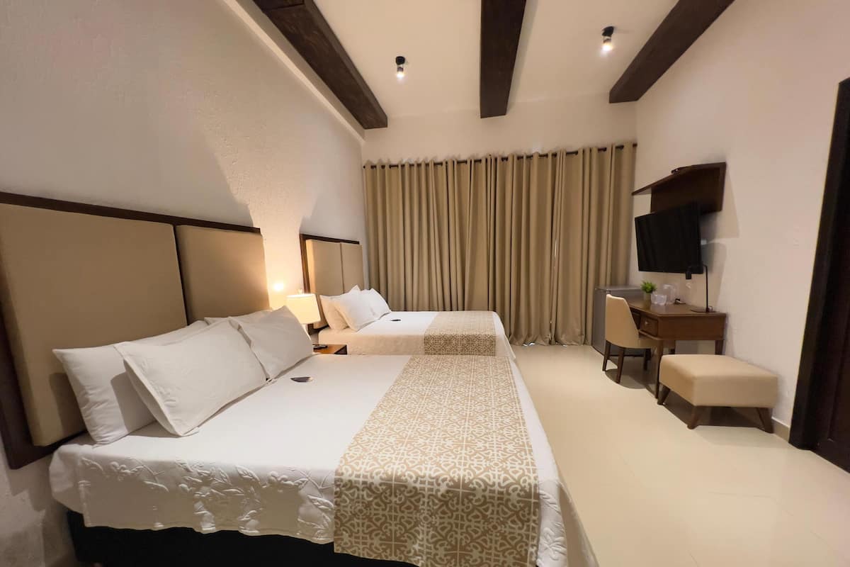 Desk, laptop workspace, free WiFi, bed sheets