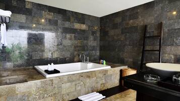 Combined shower/tub, free toiletries, hair dryer, bathrobes