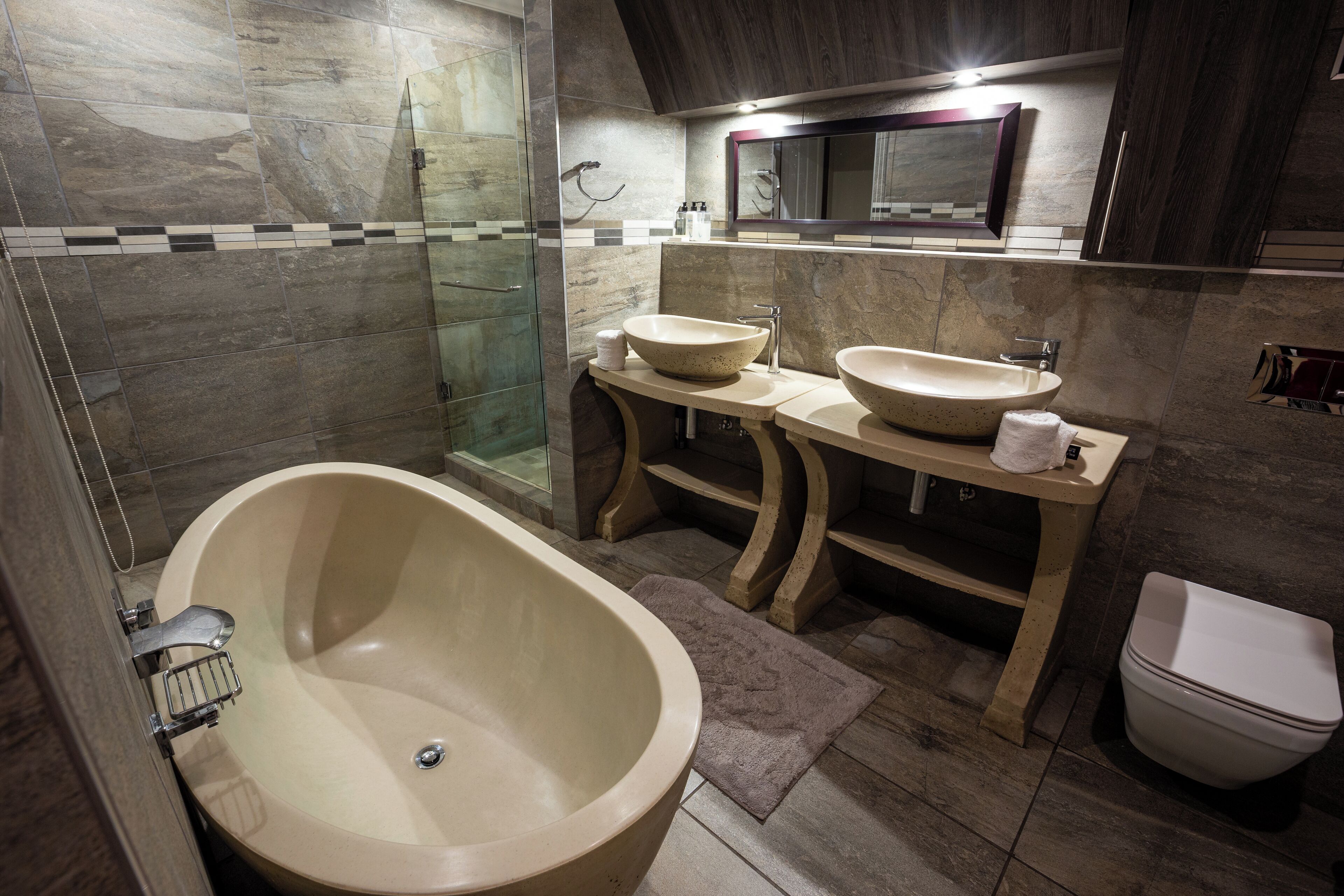Family Apartment | Bathroom | Separate bathtub and shower, deep-soaking bathtub, rainfall showerhead