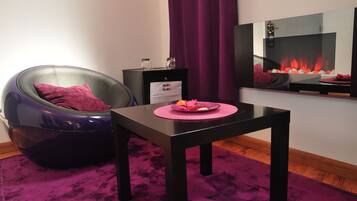 Junior suite | Een minibar, individueel gedecoreerd, verduisterende gordijnen