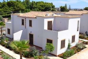 Seasonal outdoor pool, pool loungers