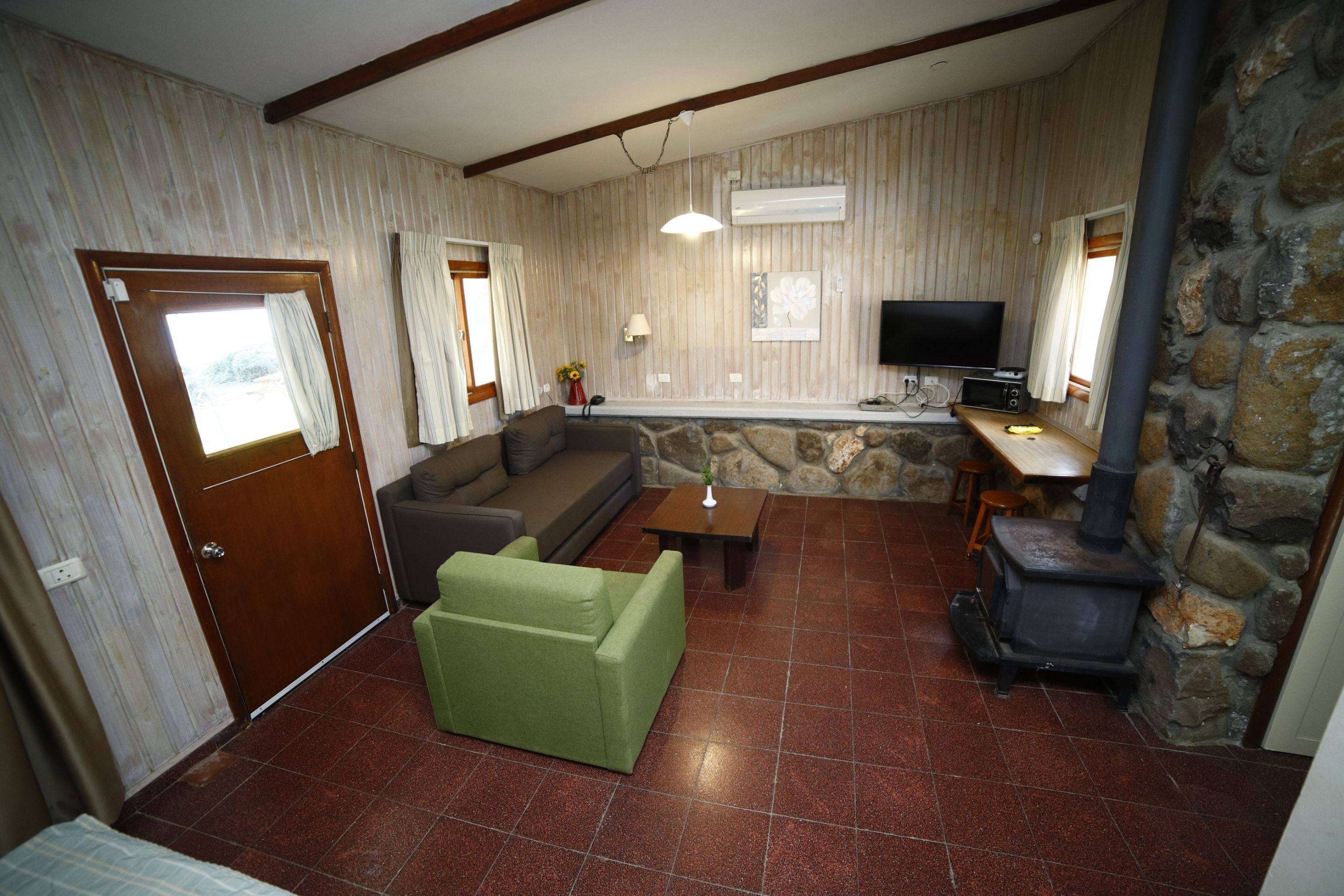 studio with jacuzzi | living area | 38-inch tv with satellite channels, table football, ping pong