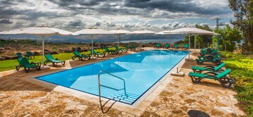 Seasonal outdoor pool, pool umbrellas