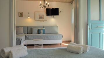 Suite, 1 Bedroom | Living area | Flat-screen TV, DVD player, table tennis, toys