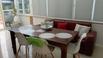 Comfort Apartment, 3 Bedrooms | Living area | LCD TV