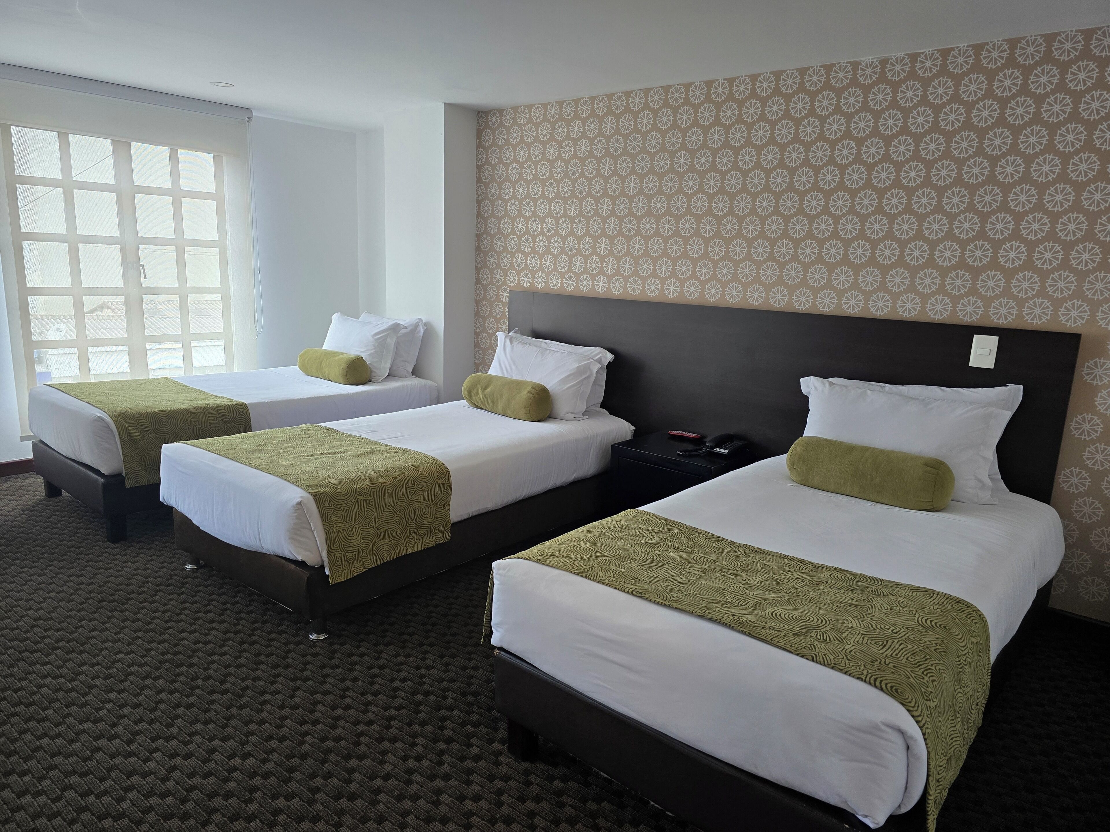 Business Triple Room | Down comforters, minibar, in-room safe, desk